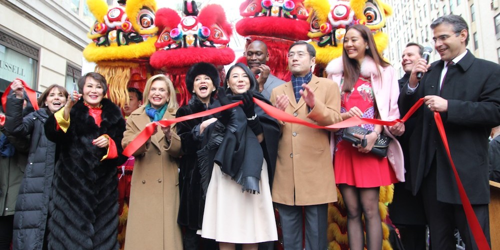 A ribbon cutting is held to celebrate the partnership between Madison Avenue BID and the Shanghai Bund Association at "Madison Street to Madison Avenue" Lunar New Year Celebration on Feb. 6, 2016 in New York City. Photo by Lia Chang