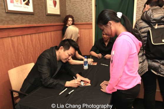 Jay Kuo signs the ALLEGIANCE Original Cast Recording at Barnes and Noble in New York on February 5, 2016. Photo by Lia Chang