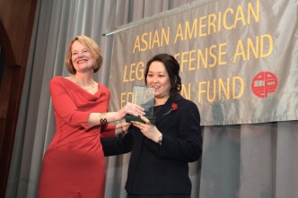 Louise M. Parent, Of Counsel at Cleary Gottlieb Steen & Hamilton LLP, presented the award to Heidi C. Chen, Executive Vice President and General Counsel of Zoetis at the AALDEF lunar new year gala at PIER SIXTY, Chelsea Piers in New York City on February 16, 2016. Photo by Lia Chang